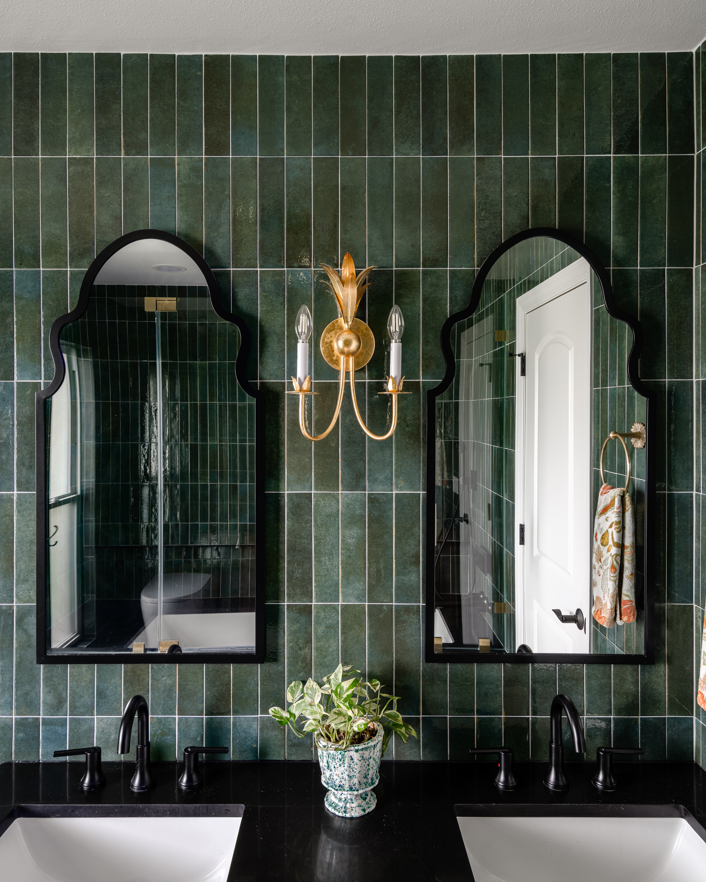 Double arched mirrors — modern master bath